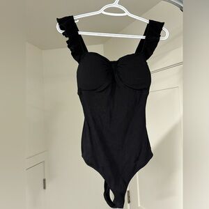 Black ruffled bodysuit